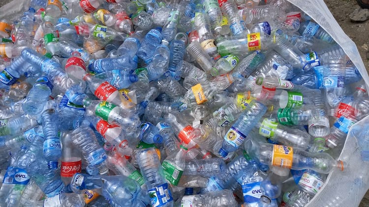 bag of plastic water bottles in Nigeria